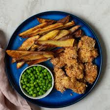 Chicken Nuggets and Crispy Potatoes with Peas or Beans